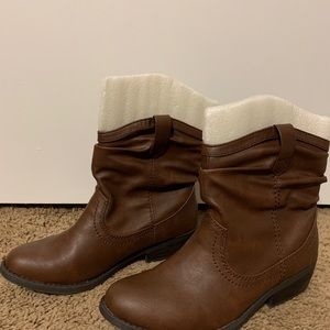 Woman’s brown low ankle booties
